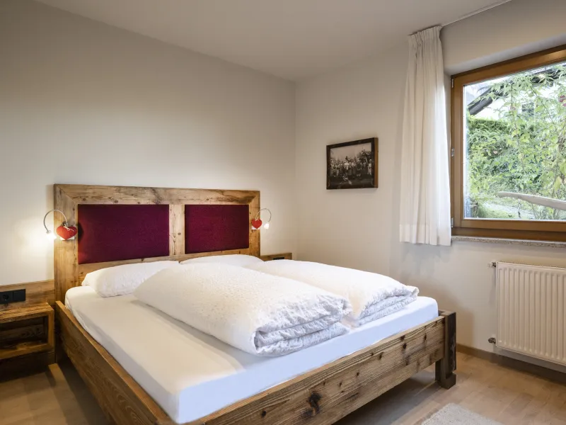 Ferienwohnung Dissertorihof Kaltern Vernatsch Schlafzimmer