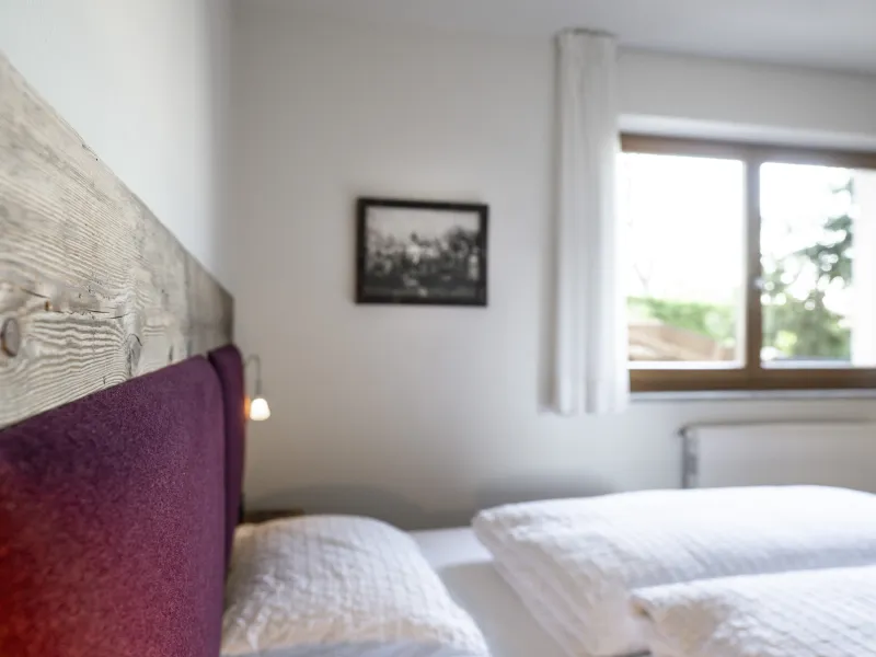 Ferienwohnung Dissertorihof Kaltern Vernatsch Schlafzimmer