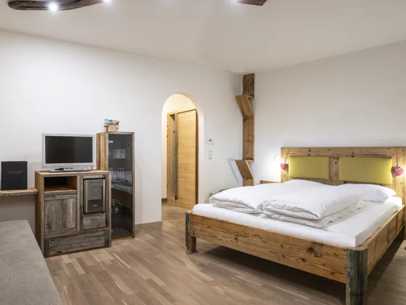 Ferienwohnung Dissertorihof Kaltern Weißburgunder Schlafzimmer