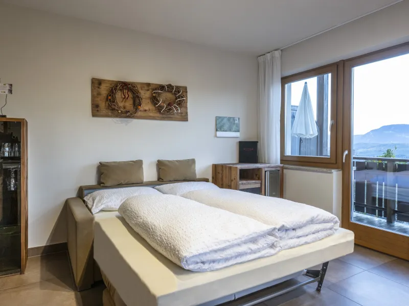 Ferienwohnung Dissertorihof Kaltern ausziehbares Sofa