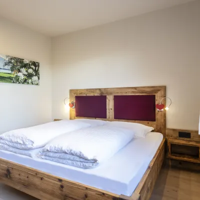 Ferienwohnung Dissertorihof Kaltern Vernatsch Bett