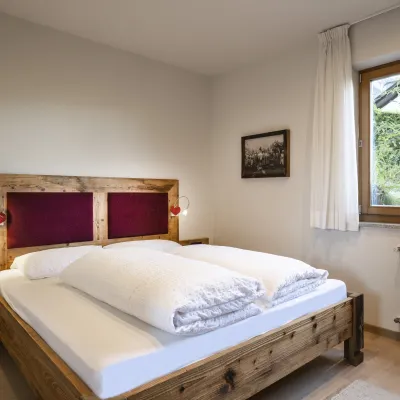 Ferienwohnung Dissertorihof Kaltern Vernatsch Schlafzimmer