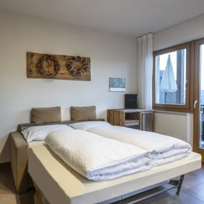 Ferienwohnung Dissertorihof Kaltern ausziehbares Sofa