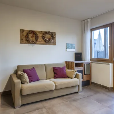 Ferienwohnung Dissertorihof Kaltern ausziehbares Sofa