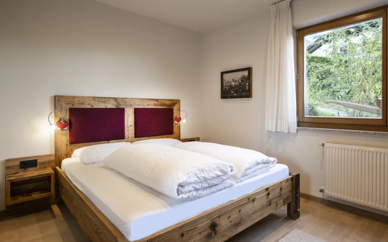 Ferienwohnung Dissertorihof Kaltern Vernatsch Schlafzimmer