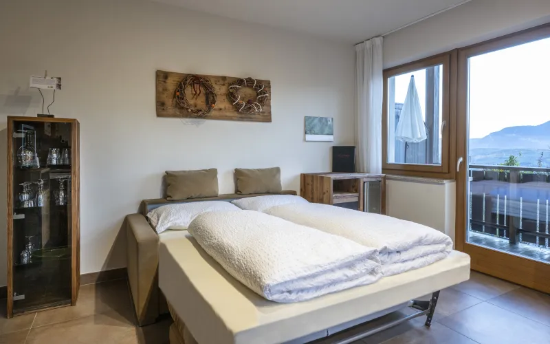 Ferienwohnung Dissertorihof Kaltern ausziehbares Sofa